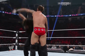 Dean Ambrose hit by Rollins